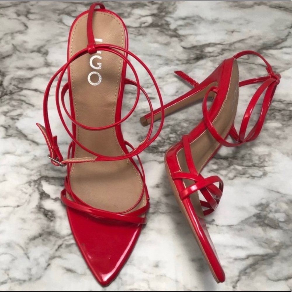 Red patent leather straps heels